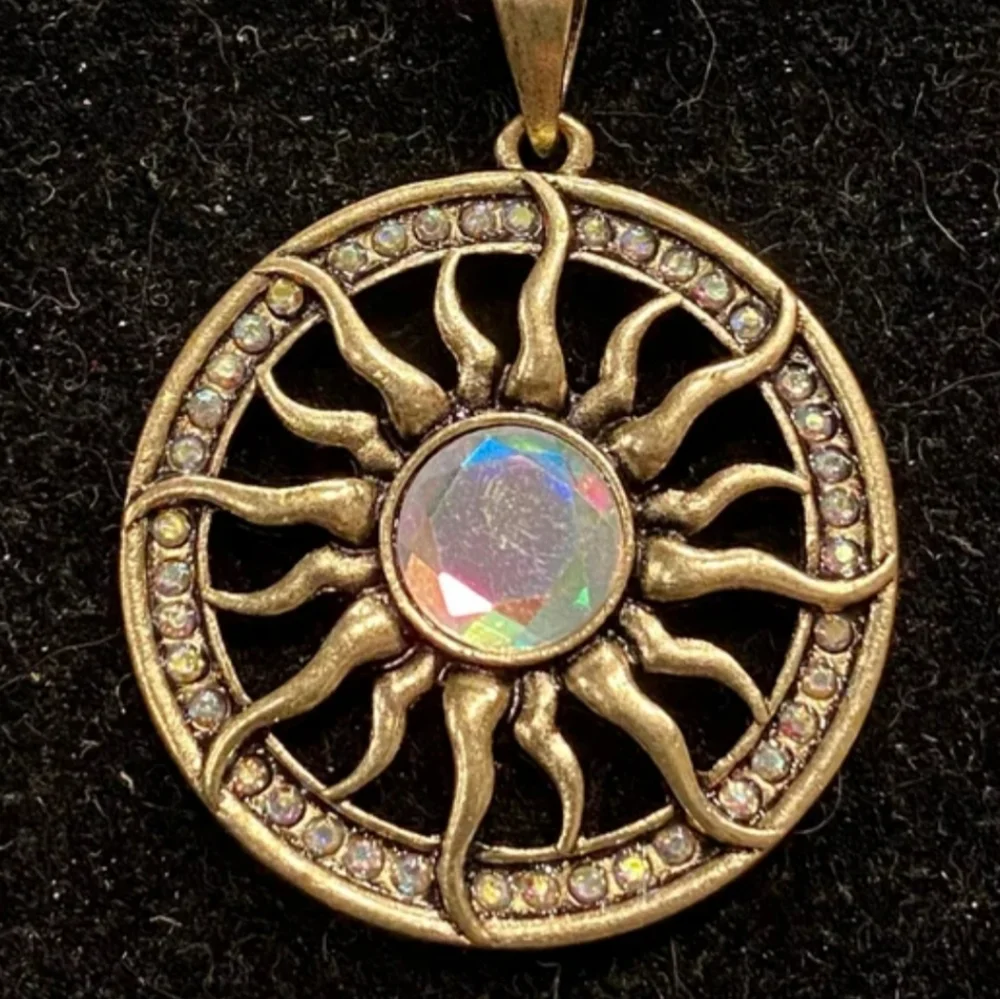 Radiant Gold Sunburst Necklace with Central Gem